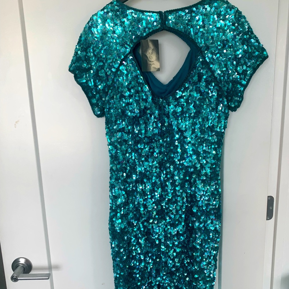 Beautiful blue sequined dress with cutouts